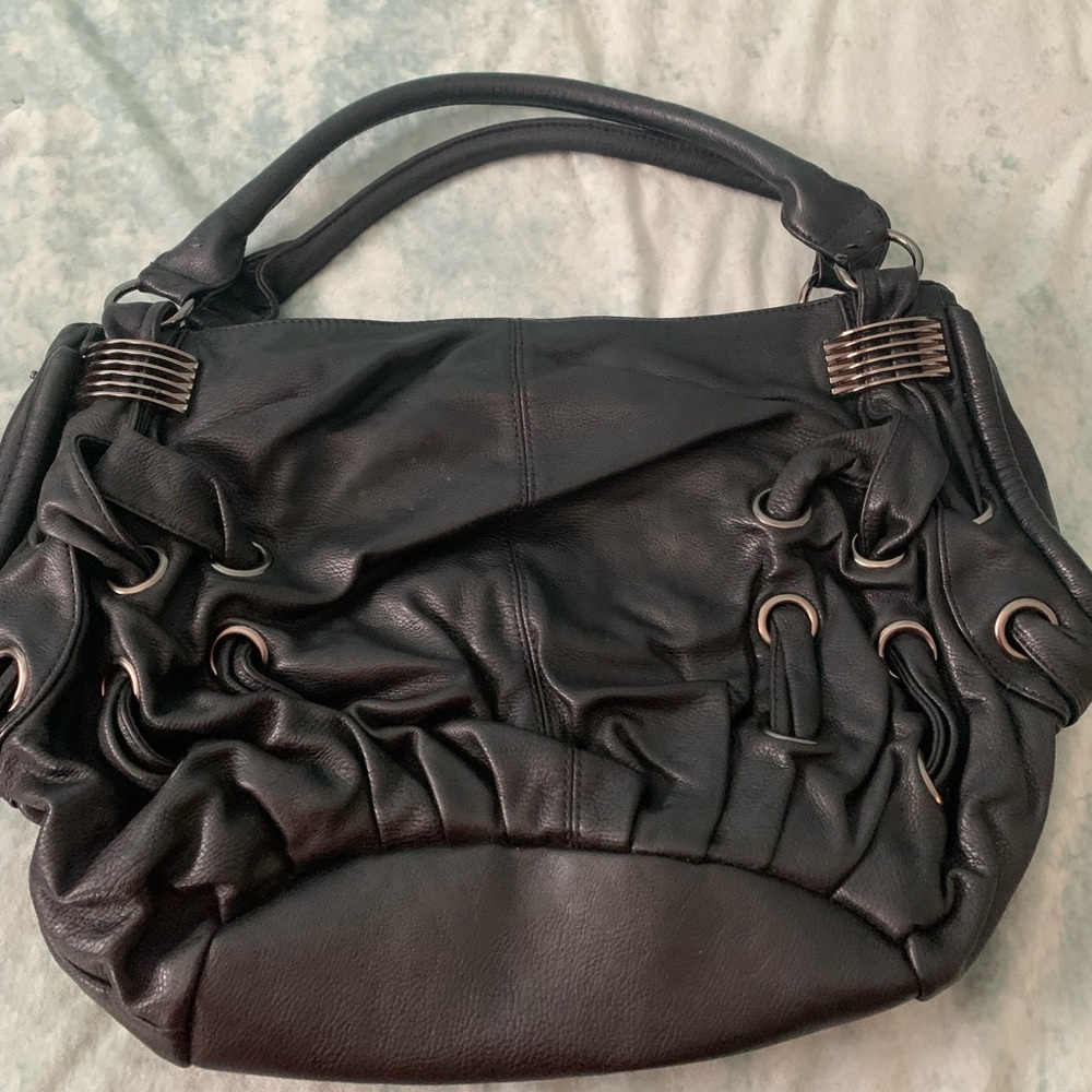 Black purse Alyssa brand - dust bag- lots of pockets
